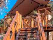 Steps up to a safari tent
