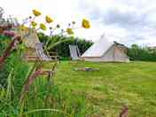 Non-electric grass tent pitch with space for a bell tent