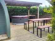 Pod with outdoor seating and hot tub