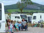 Spacious pitch with electric hook up, individual water tap, grey waste, TV connection and free wifi