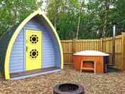 Forest camping pod with wood fired hot tub