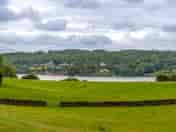 View across the camping field to the lake (added by manager 10 Aug 2023)