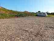Compacted shale hard standing pitch