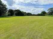 Spacious neatly mown camping field