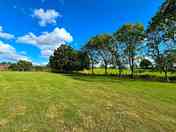 The top half of the camping field, looking out over fields