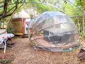 Hot tub and exterior of the yurt