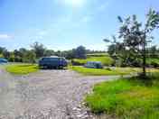 Campervans, caravans and motorhomes on their pitches