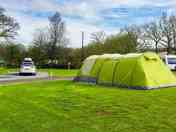 Electric optional grass tent or trailer tent pitch