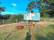 Badger's Retreat shepherd's hut with bench and firepit