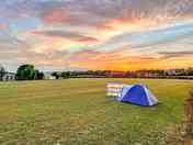 The pitch field at sunset