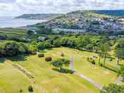 Birds eye view of pods, non electric camping area and beach