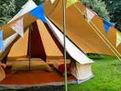 Bell tent with awning and bunting