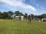 Grass non electric pitches overlooking the children’s play area