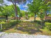 Small, partially shaded pitch