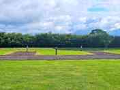 Hardstanding pitch with grass and electric hook-up