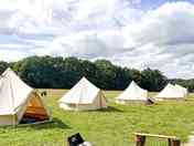 Empty bell tents in a line