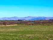 View of Snowdonia from the site