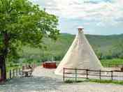 The landscape that can be enjoyed from the tepee is wonderful among the Maremma hills