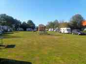 Grass pitches around a playground