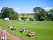Camping field and picnic benches