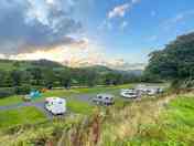 Electric hardstandings and electric grass pitches with non electric grass pitches through gate