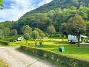 Pitches next to wooded slopes