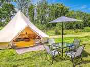Bell tent with dining area