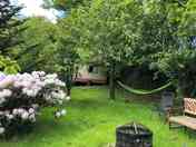 The garden with firepit and hammock