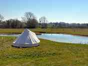 Bell tent by the pond