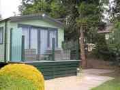 Front view with balcony complete and shingle