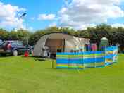 An XL pitch will take a tent like this; this pitch will also take tents with pods