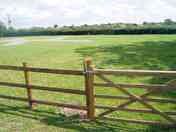 Tranquil site overlooking open countryside