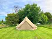 Rent a pre-pitched bell tent including pitch fee. Bring your own camping gear.