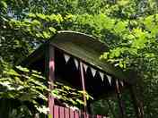 Pretty Shepherds Hut, beautifully furnished is a gorgeous setting.