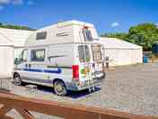Motorhome pitch behind the marquee