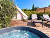 Hot tub and sunloungers