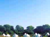 View from the outside of Bell Tent furnished