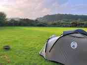 Vast open skies, flat green grass and a sunset to enjoy