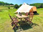 Bell tent with seating