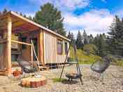 The cabin and outdoor seating