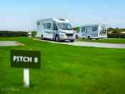 A motorhome on one of our fully-serviced pitches.