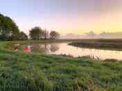 riverside sunsets and sunrise
