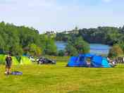 Camping field overlooking Castle Howard and lake.