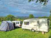 View if our caravan with view in the background (added by visitor 15 Aug 2023)