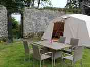 The safari tent and outdoor seating
