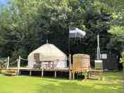 Private single yurt and wood fired hot tub in a rural setting at Mylor Bridge, Cornwall.