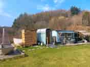 View of hot tub, toilet, shower, Shepherd's hut & kitchen (added by manager 16 May 2022)