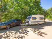 Shaded caravan pitch