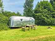 Airstream with table, chairs and fire basket (added by manager 02 Sep 2022)