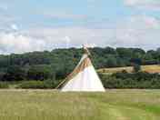 Binknoll tipi with the Marlborough Downs in the background (added by manager 20 Jan 2024)